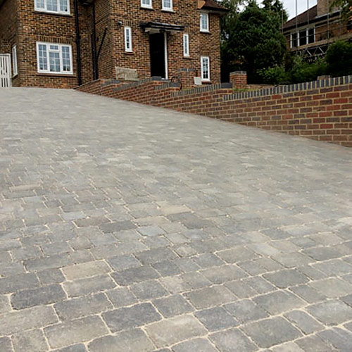 Photo of block driveway with new retaining walls