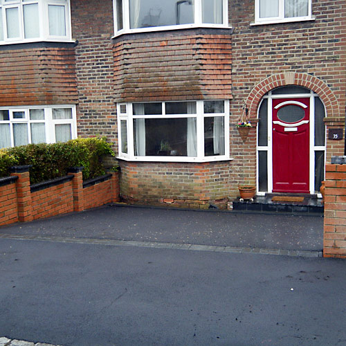 Photo of tarmac drive with vehicle crossover